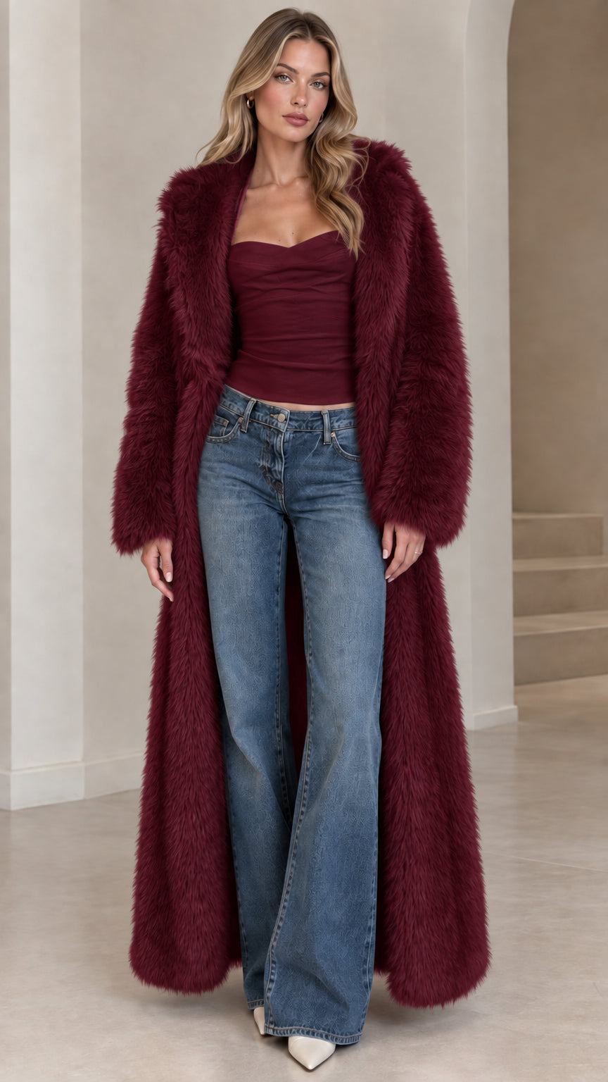 Front view of model wearing deep burgundy floor-length faux fur maxi coat