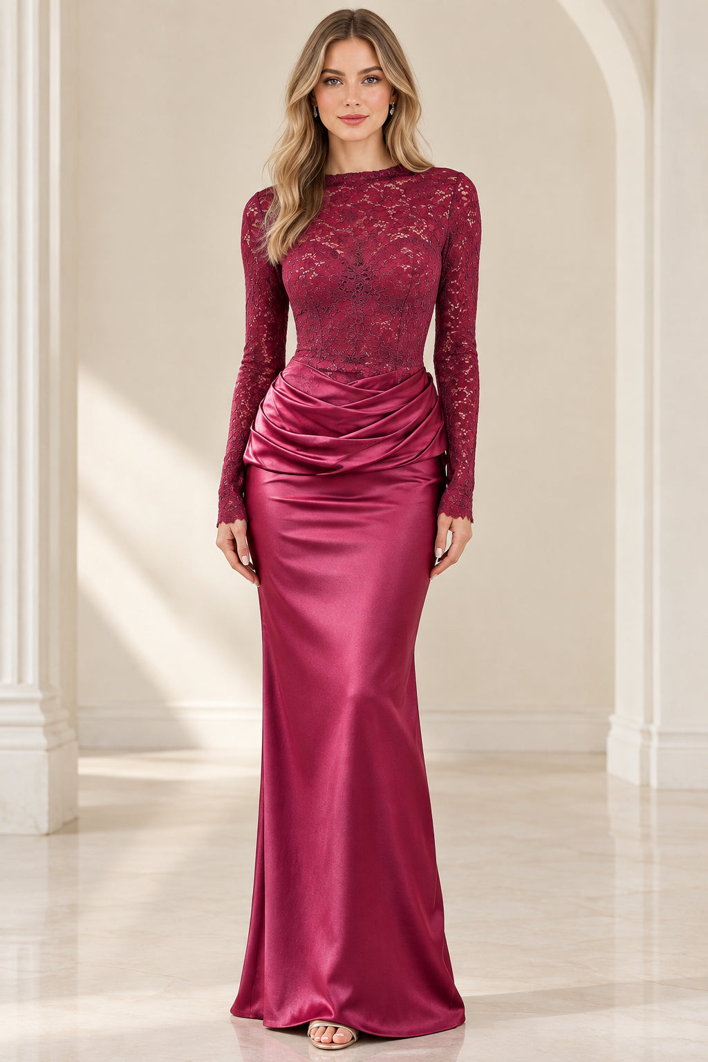 Full front view of model wearing burgundy long sleeve lace and satin maxi evening gown