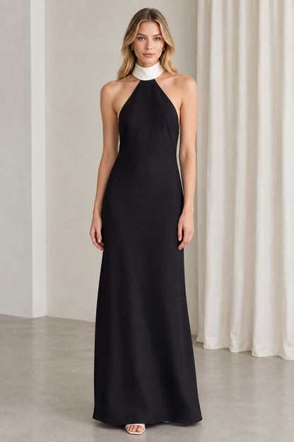 Front view of black halter neck maxi evening gown with white collar