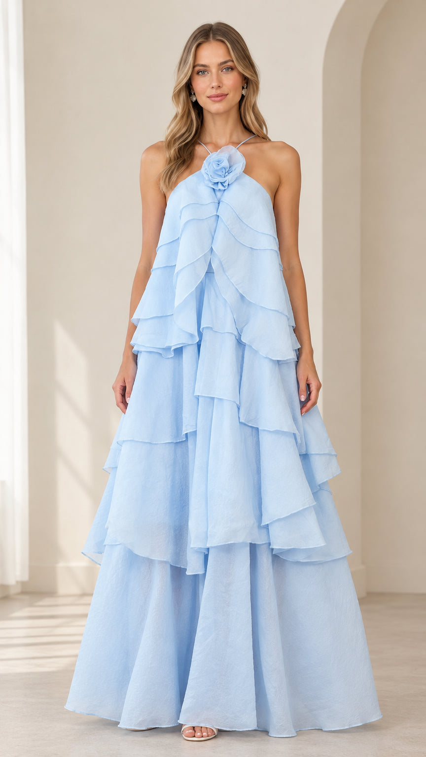 Front full-length view of model wearing Sky Blue floral applique tiered halter maxi dress