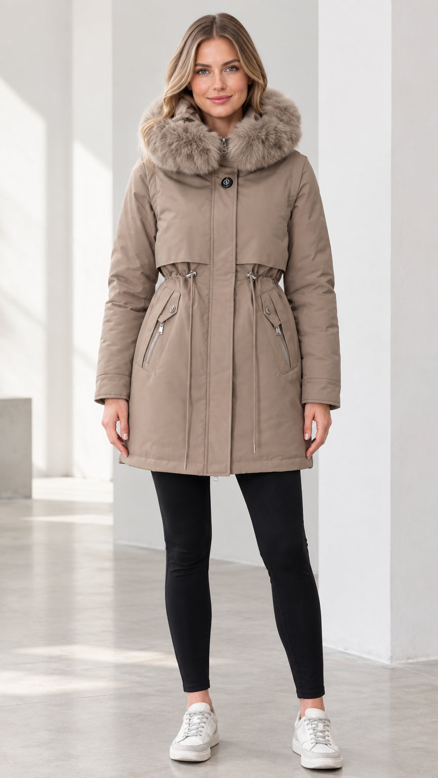 Front view of model wearing taupe faux fur hooded winter parka with drawstring waist