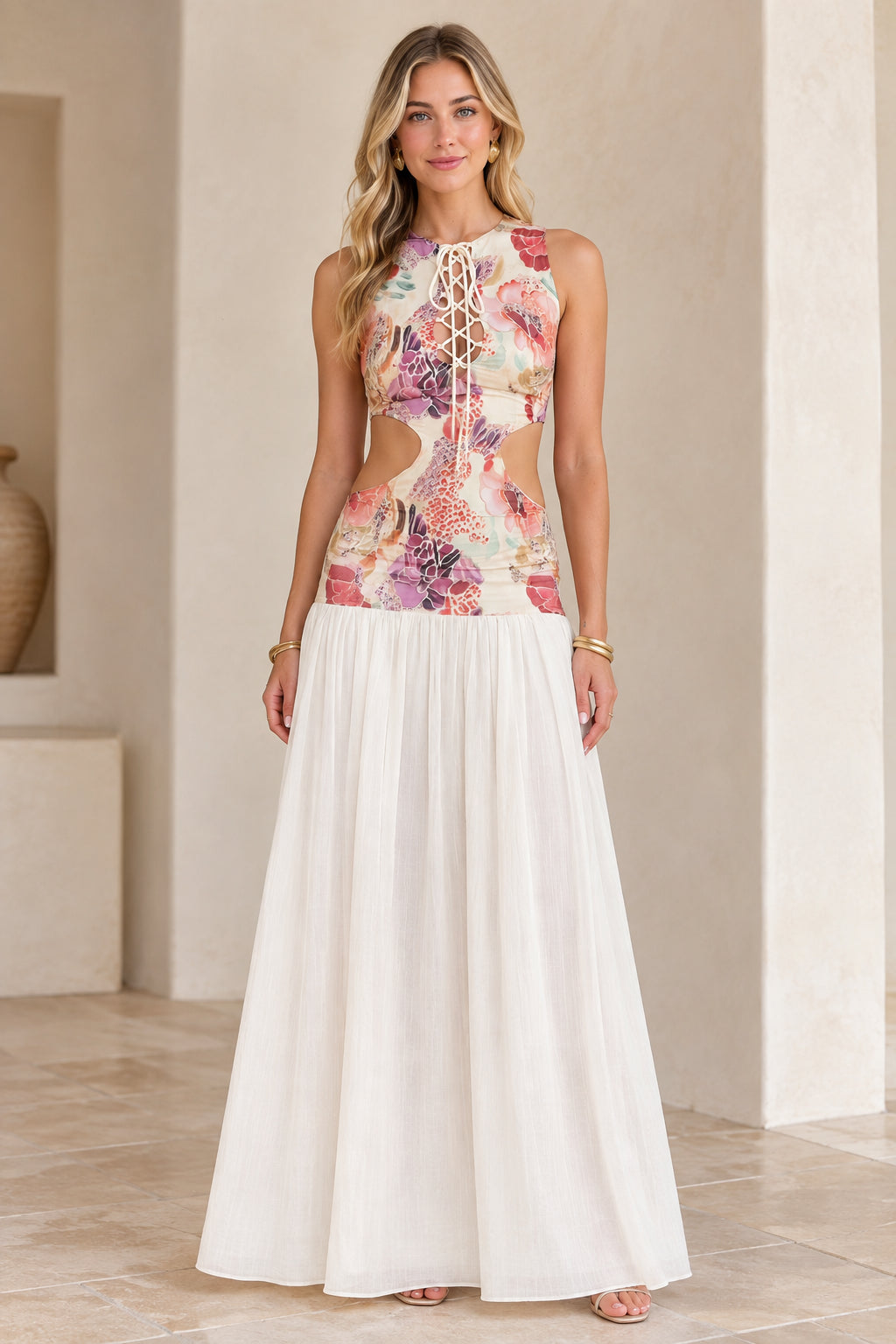Front view of model wearing White floral lace-up cutout maxi dress