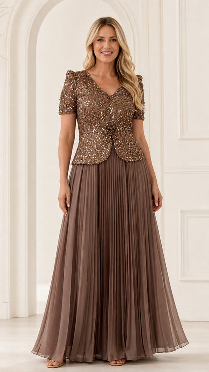 Front full view of woman wearing mocha brown sequin V-neck maxi evening gown with pleated skirt