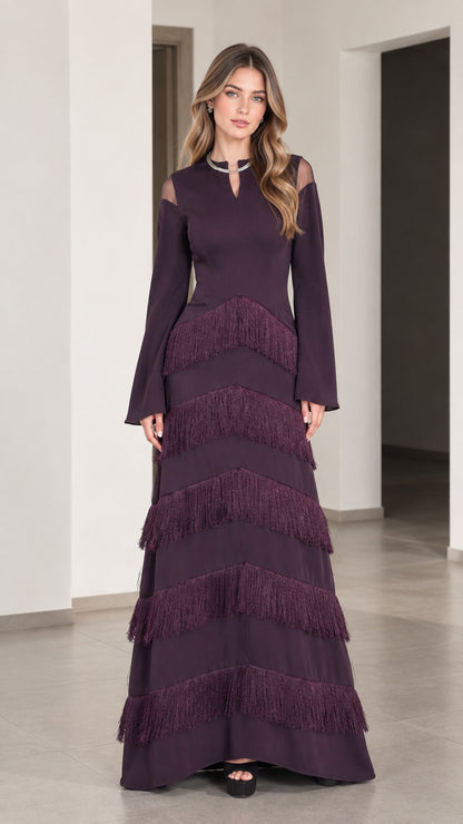 Front full view of woman wearing Plum tiered fringe long sleeve maxi evening dress