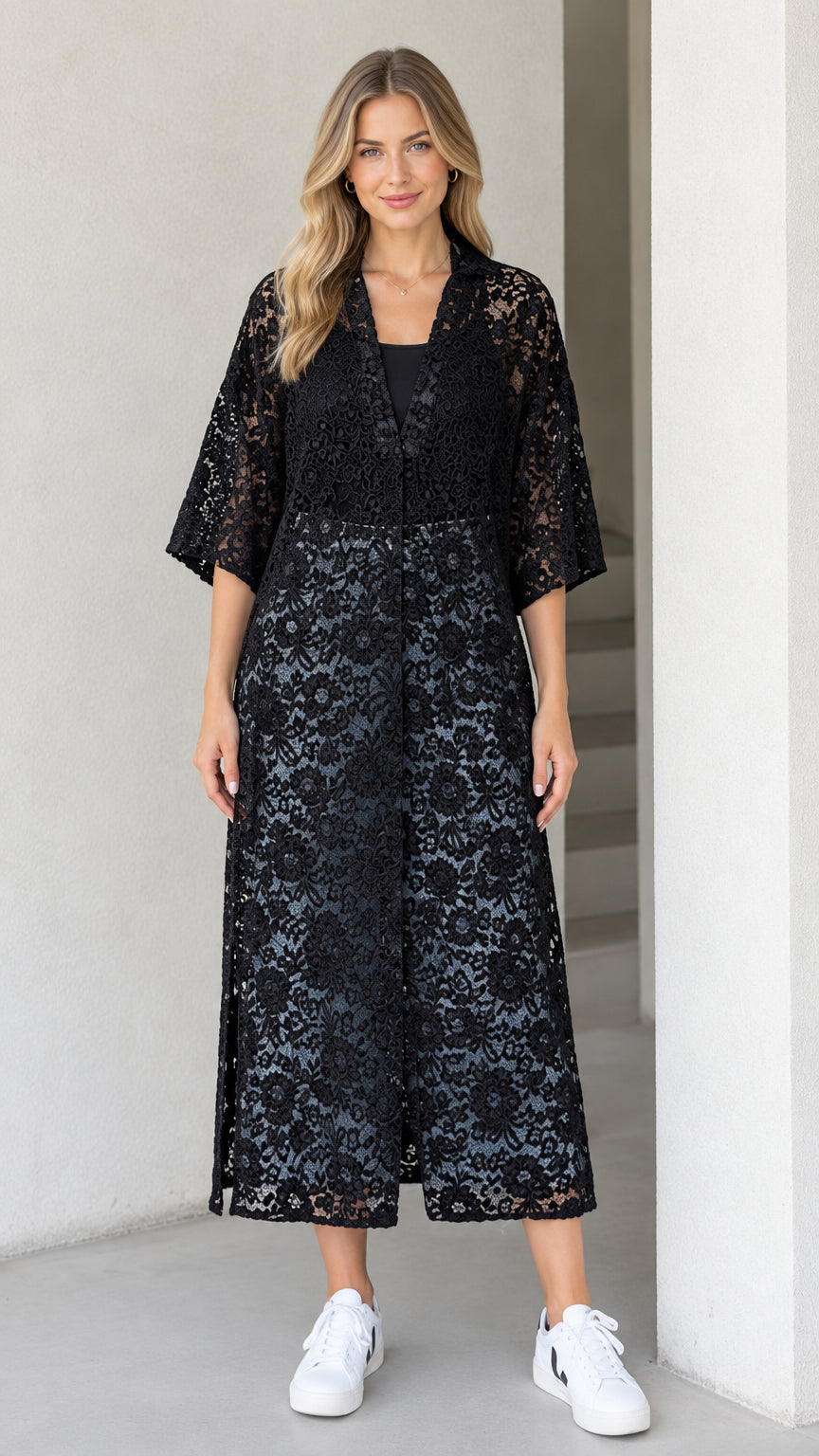 Front view of model wearing black floral lace midi duster dress with 3/4 sleeves
