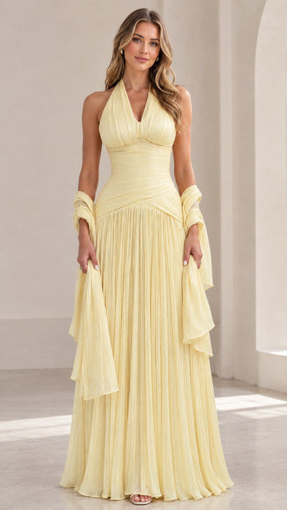 Front view of Butter Yellow halter ruched pleated maxi gown with matching shawl