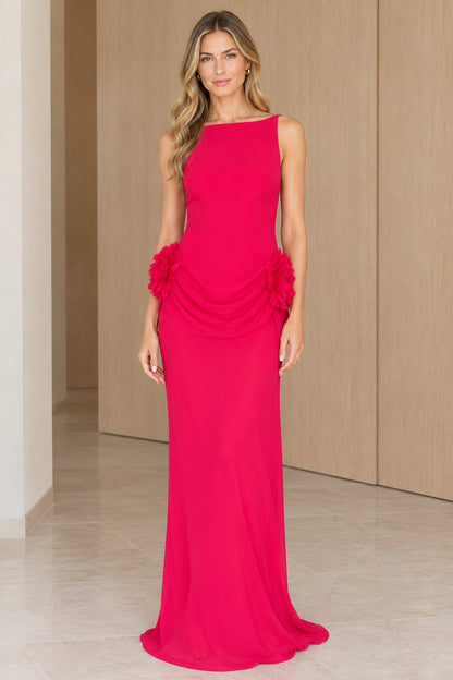 Front view of woman wearing fuchsia sleeveless maxi dress with floral rosette hip detail