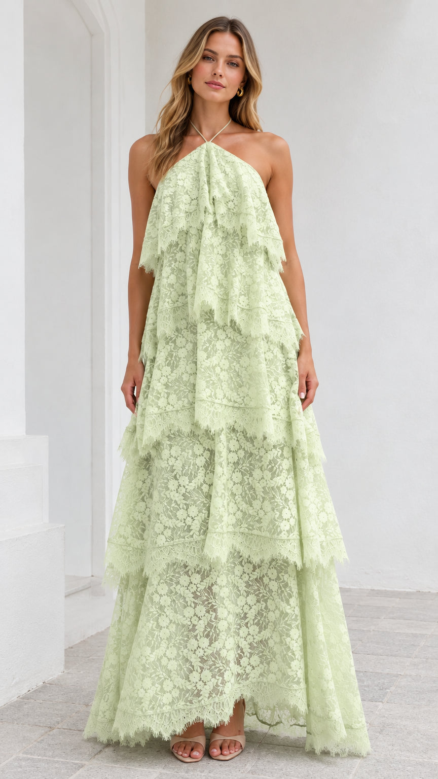 Front view of model wearing Mint Green halter tiered floral lace maxi dress