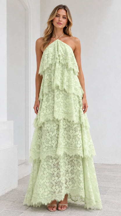 Front view of model wearing Mint Green halter tiered floral lace maxi dress