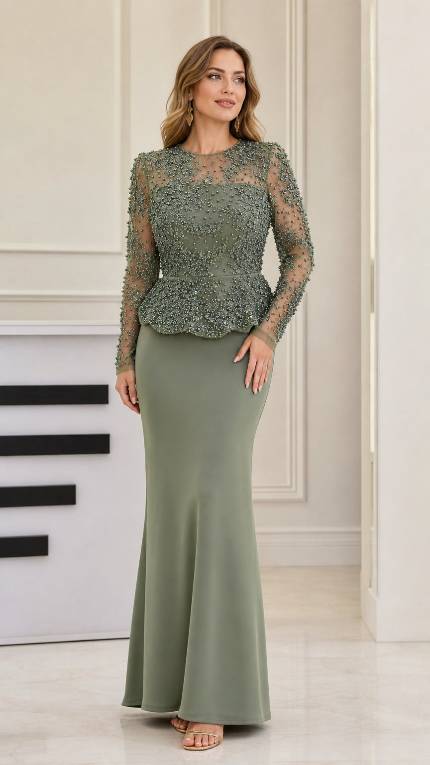 Front full view of woman wearing sage green long-sleeve beaded peplum formal maxi dress