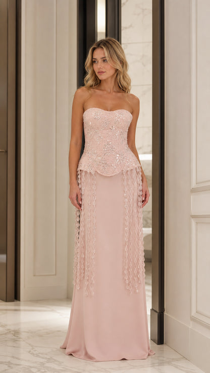 Blush pink strapless beaded lace peplum evening gown front view
