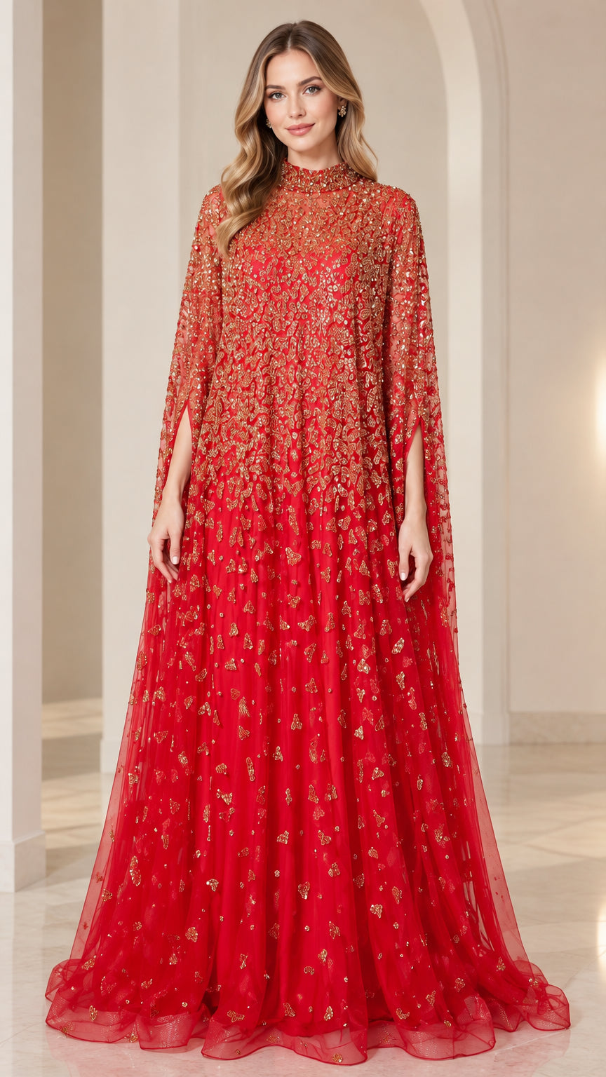 Front view of model wearing a red sequined high neck gown with dramatic cape sleeves