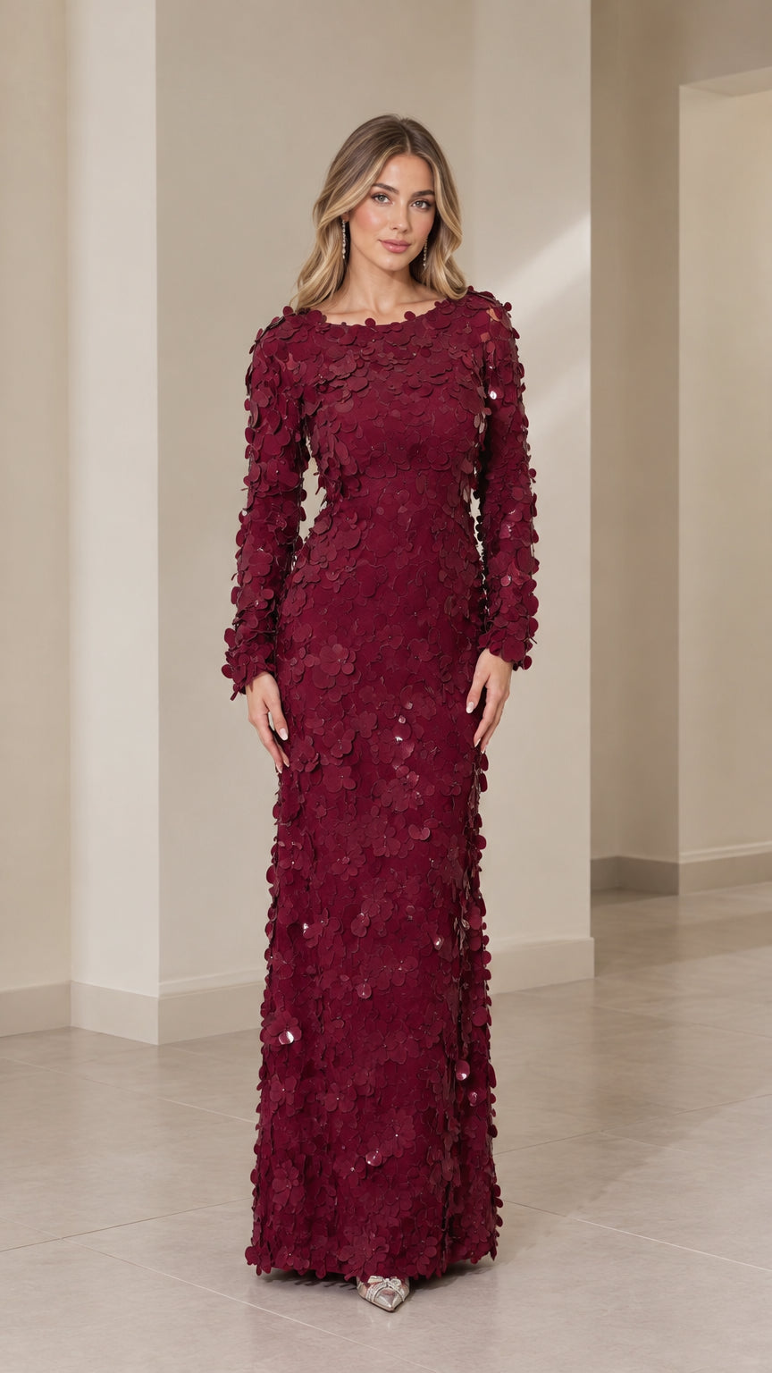 Front view of woman wearing burgundy 3D floral appliqué long sleeve maxi dress