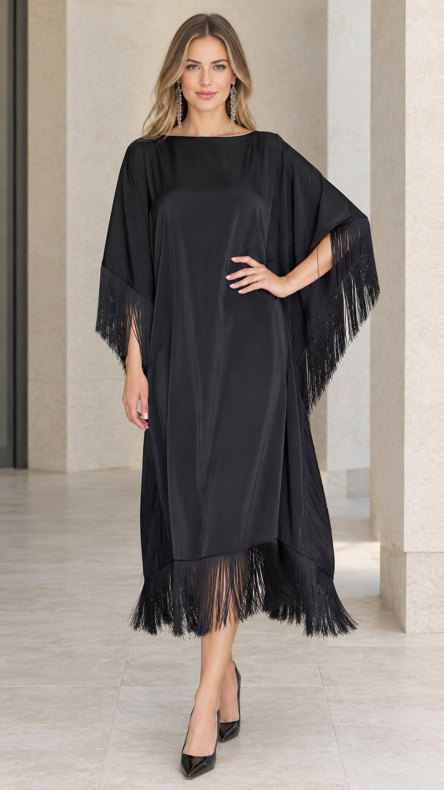Front view of black satin fringe kaftan dress with batwing sleeves