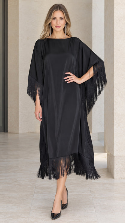 Front view of black satin fringe kaftan dress with batwing sleeves
