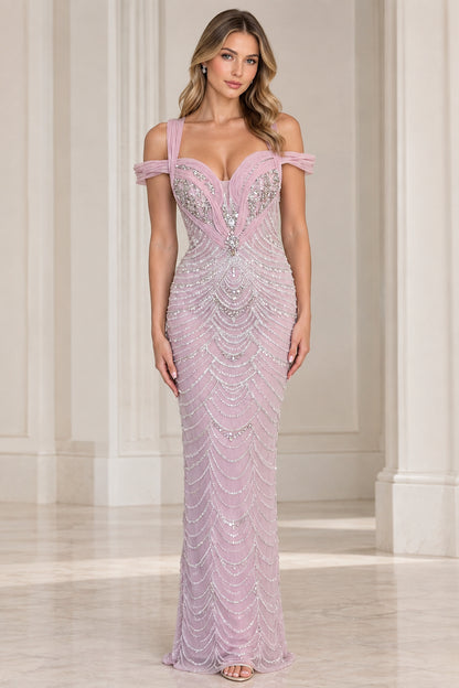 Full front view of a woman wearing a lavender beaded formal evening gown with draped tulle straps