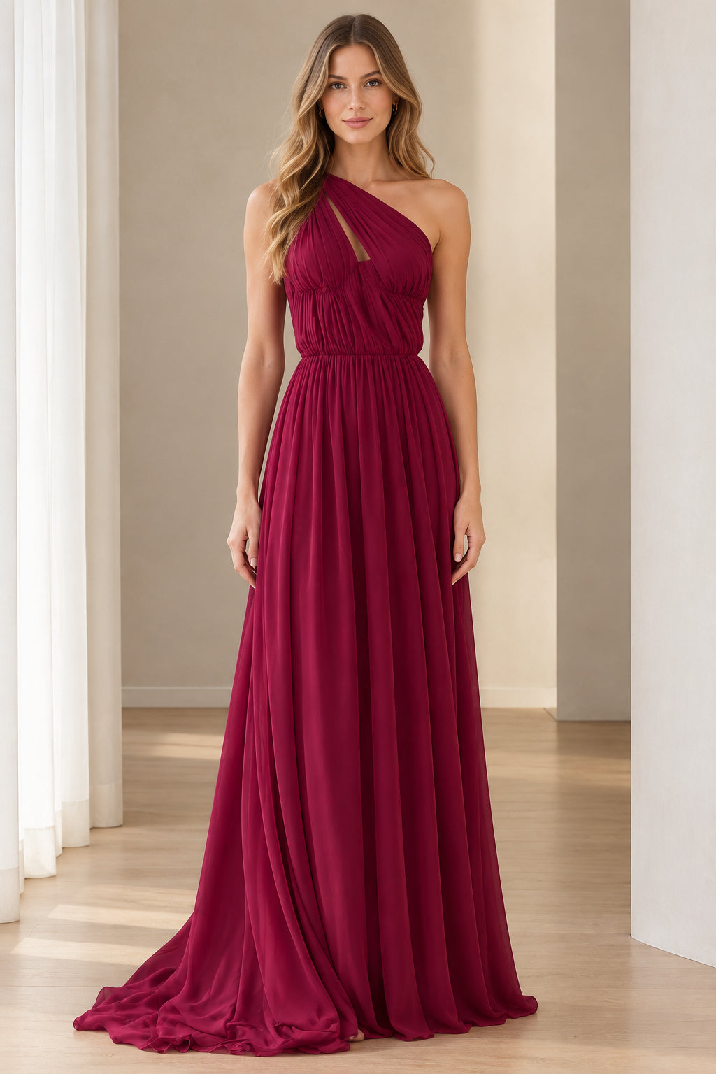 Front view of woman wearing burgundy one-shoulder pleated chiffon maxi evening gown