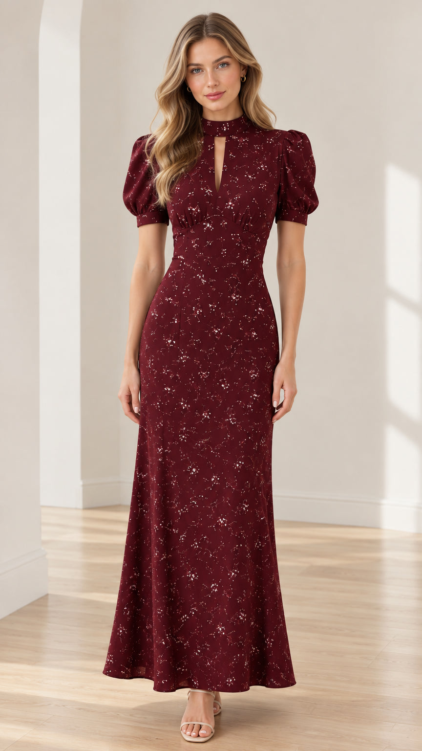Front view of model wearing burgundy floral print puff sleeve keyhole maxi dress