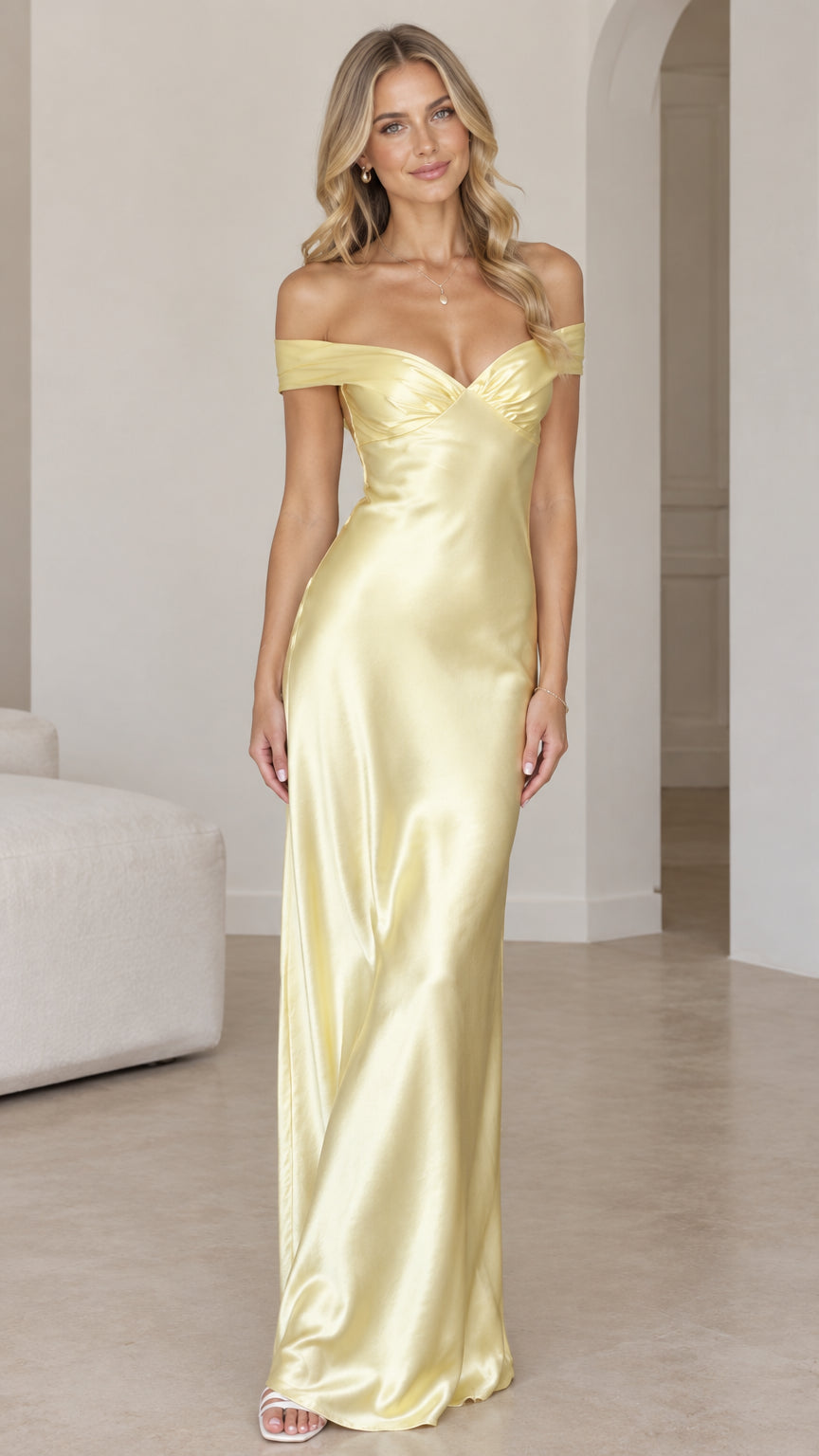 Front view of woman wearing butter yellow off-the-shoulder satin maxi dress