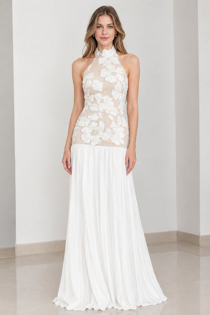 Front view of white floral applique halter neck pleated evening maxi gown