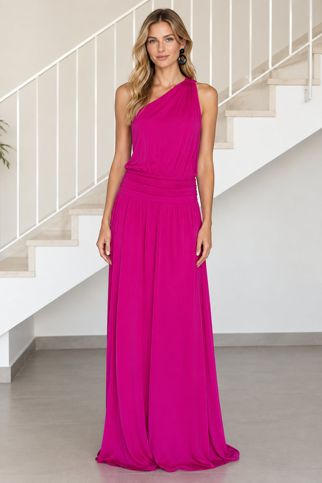 Front view of model wearing magenta one-shoulder ruched waist maxi dress