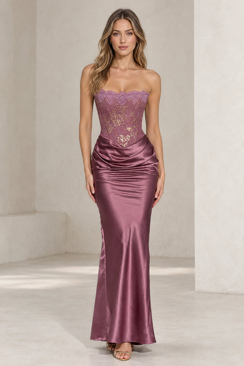 Front view of woman wearing strapless mauve satin lace corset evening maxi dress