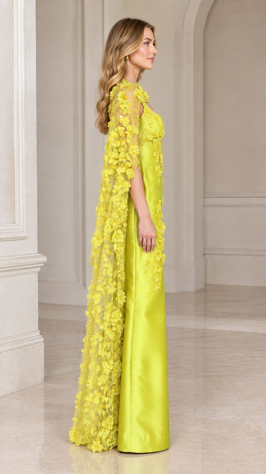 Side profile view of lime green floor-length cape evening gown