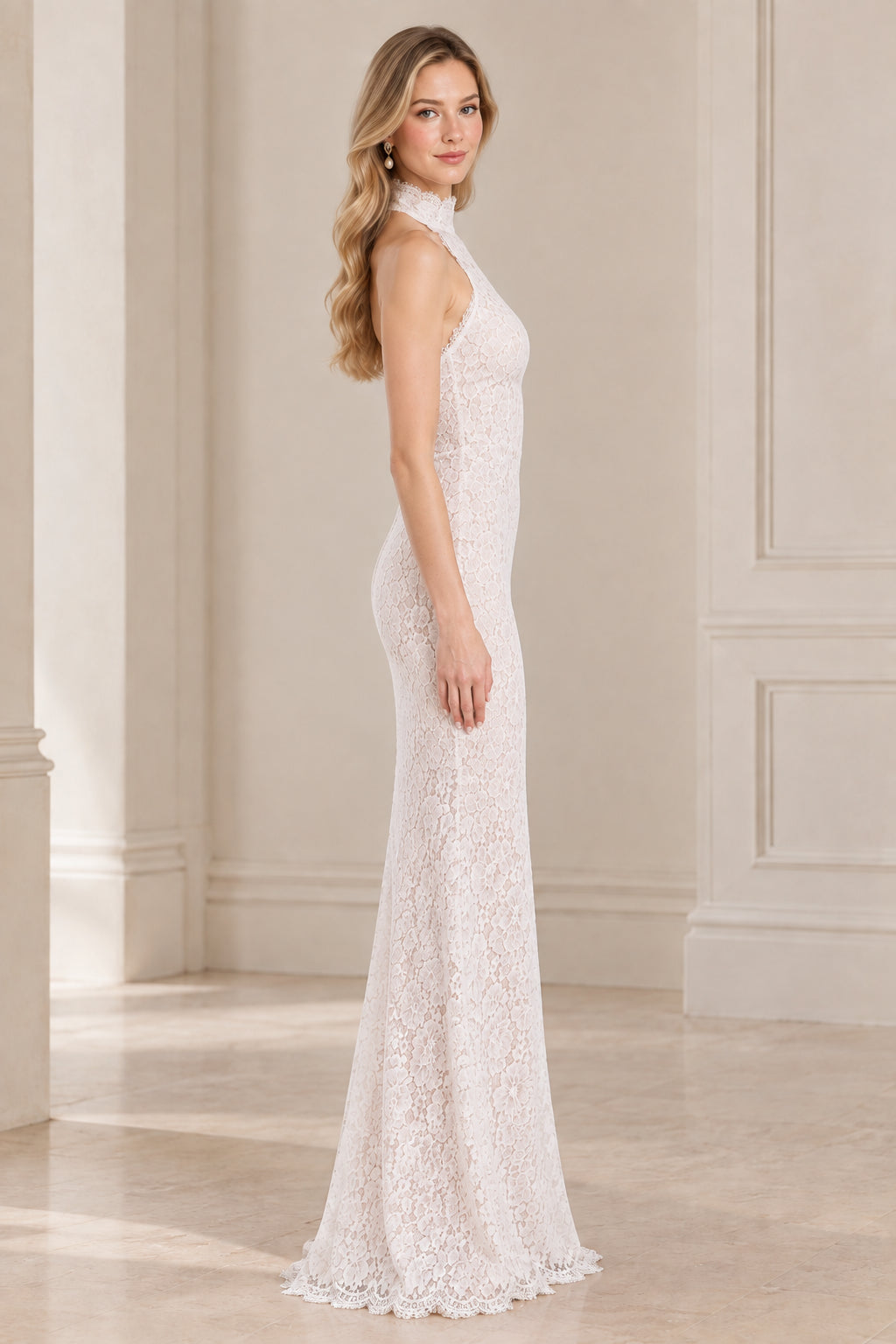 Side profile of white halter lace evening gown
