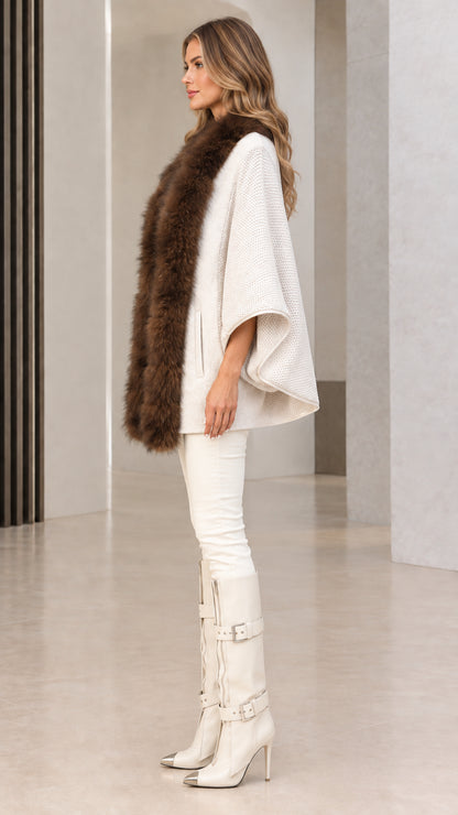 Side profile of off-white faux fur trim knit poncho wrap cardigan