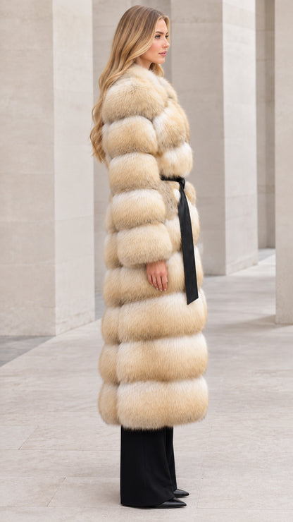 Side profile view of woman modeling long tiered golden beige faux fur maxi coat