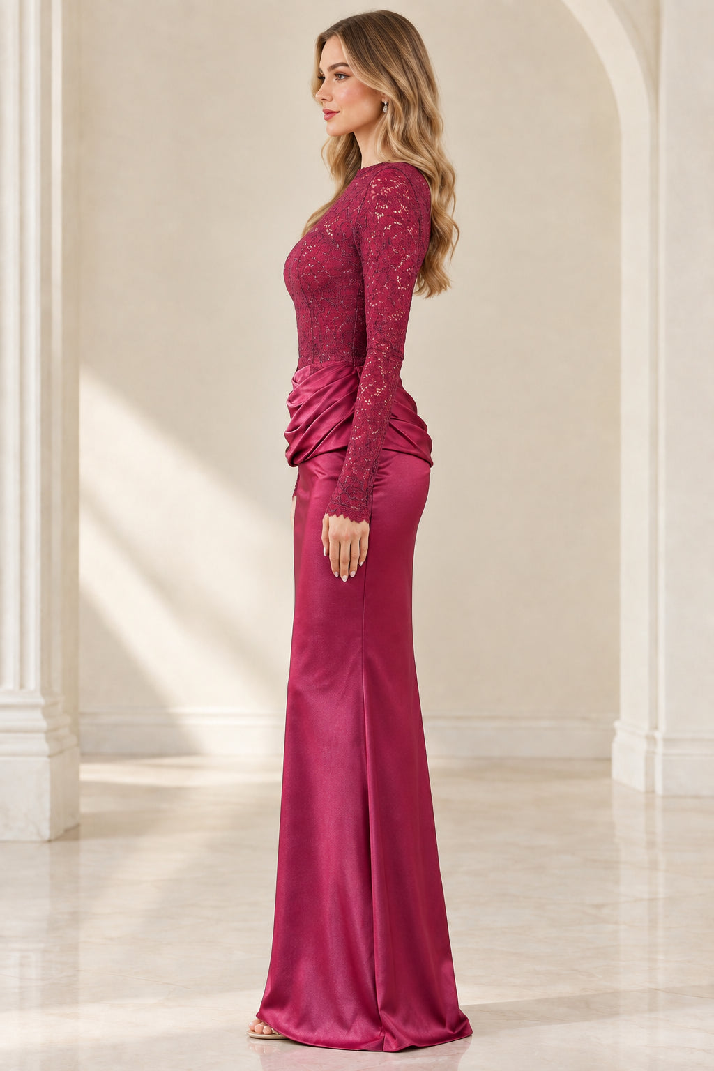 Side profile view of burgundy long sleeve lace bodice formal dress