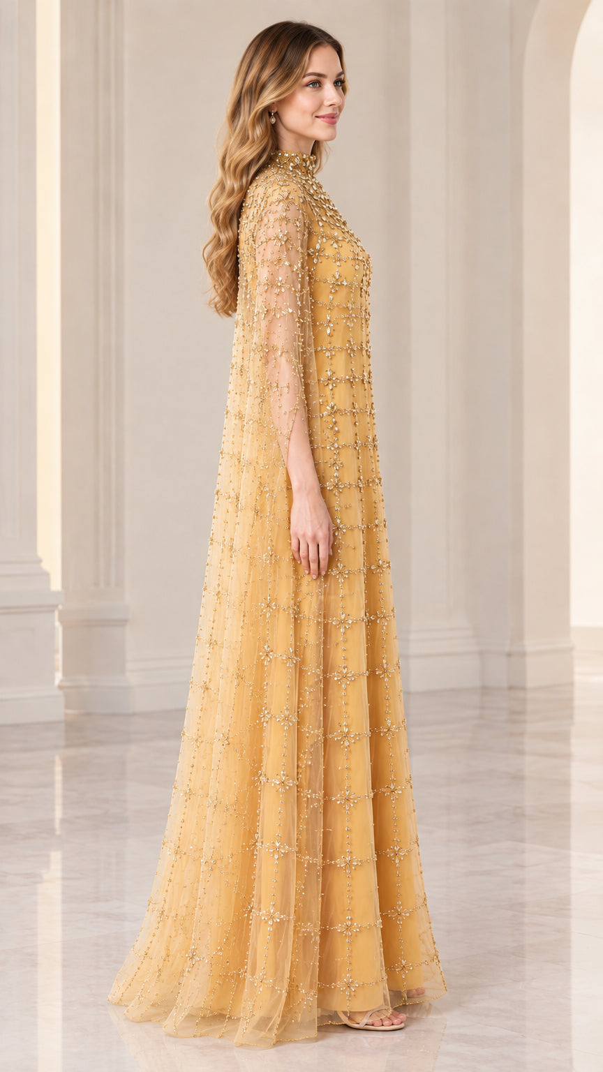 Side full view of woman wearing gold floor-length cape gown