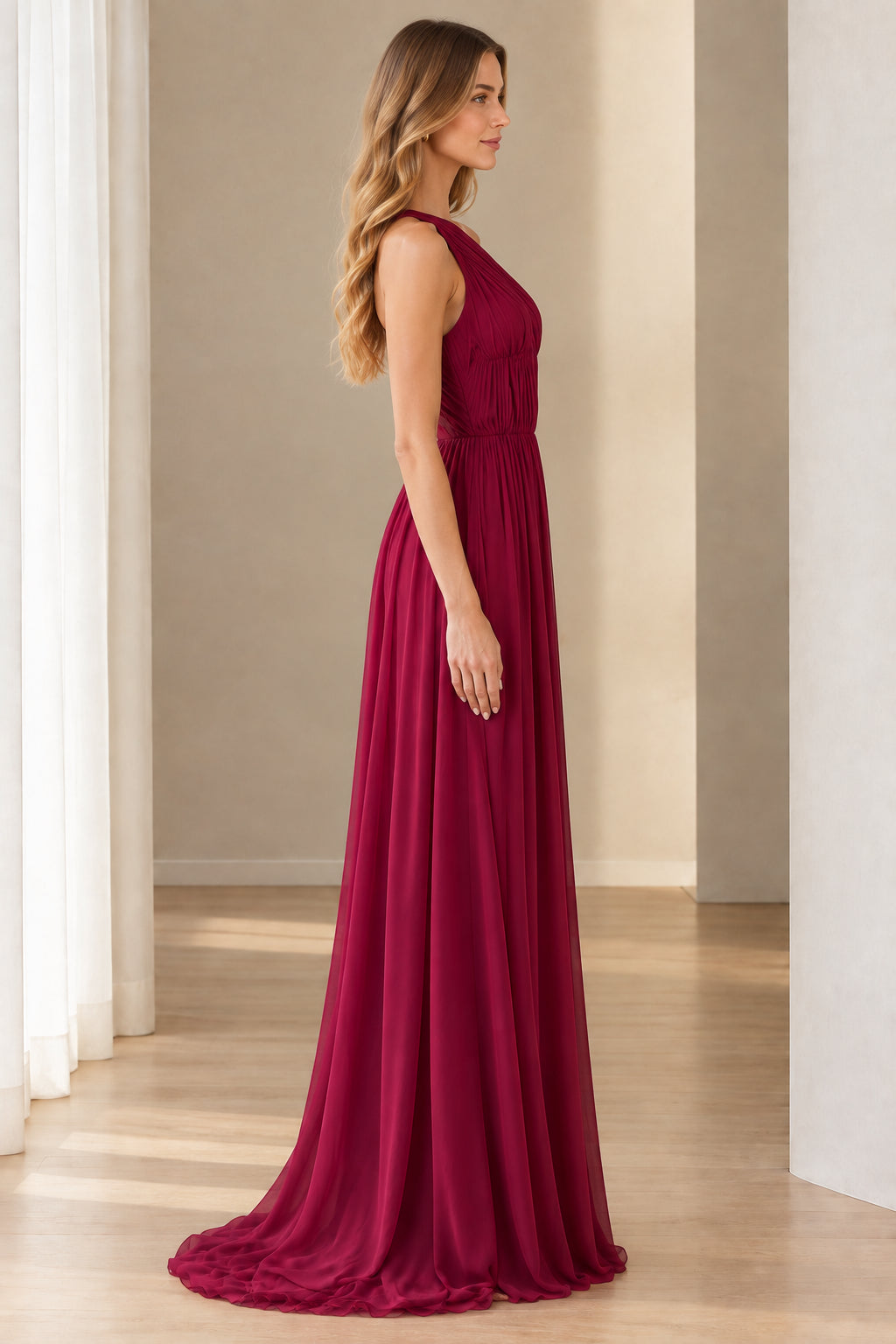 Side view of burgundy one-shoulder pleated chiffon formal dress