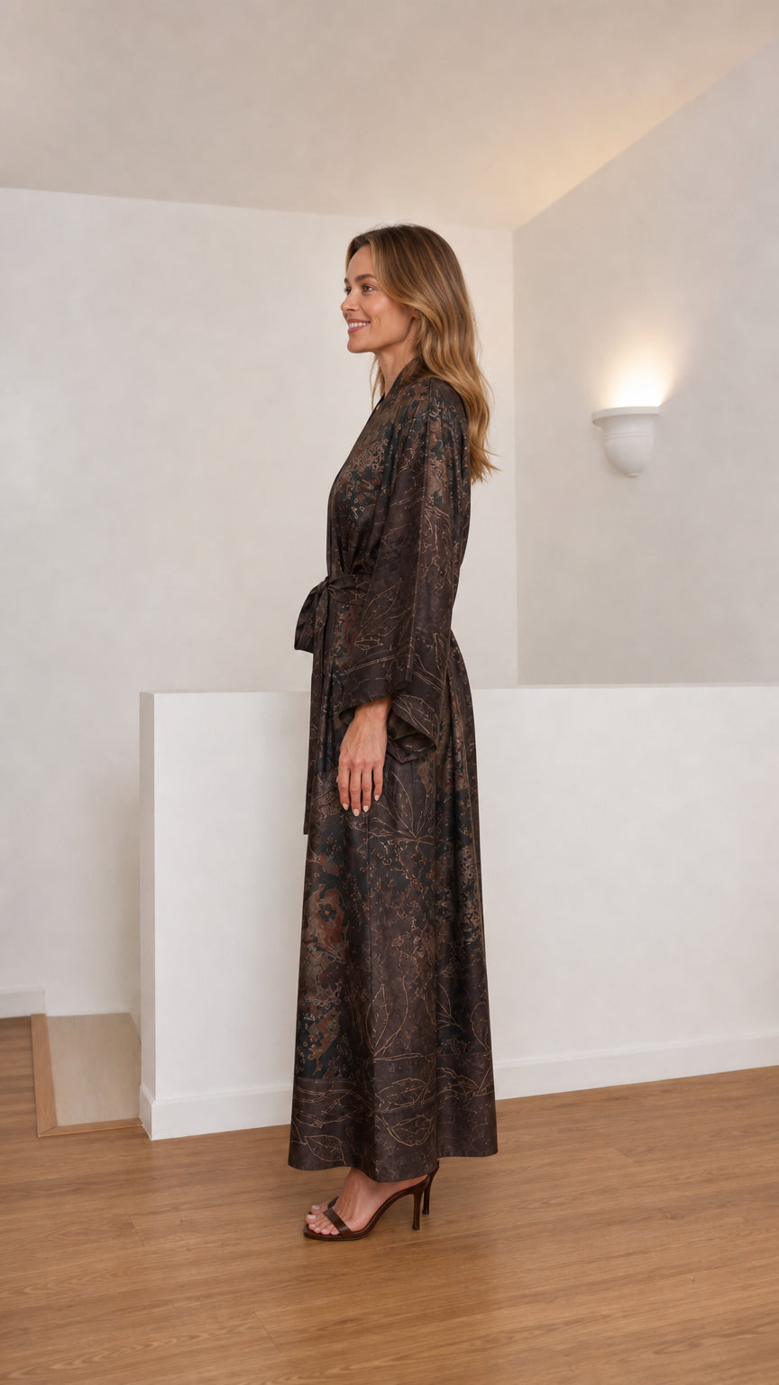 Side profile of women's dark brown printed maxi kimono robe