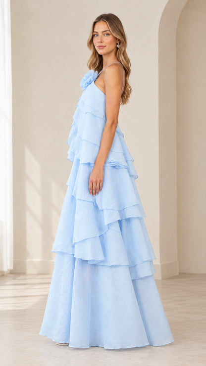 Side full-length view of model in Sky Blue tiered ruffle evening gown
