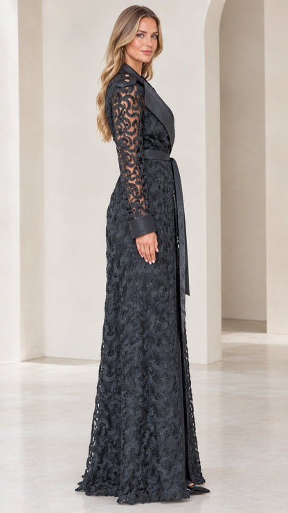 Side profile view of model wearing black floor-length lace evening duster