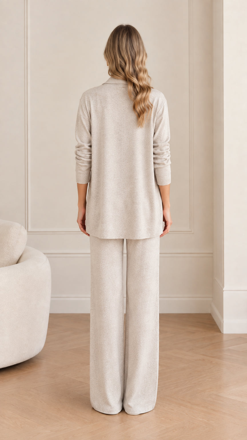 Back view of woman wearing Oatmeal 3-piece knit cardigan and wide-leg pant set