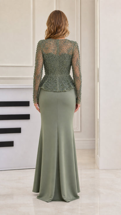 Back view of woman wearing sage green illusion beaded peplum formal dress