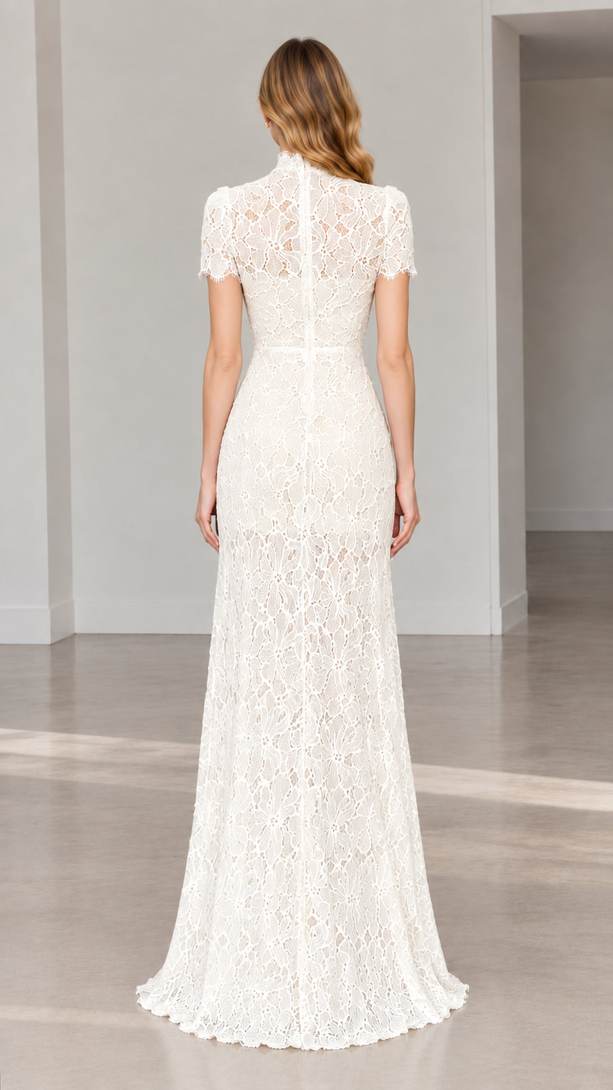 Back full-length view showing the concealed zipper of the ivory lace gown