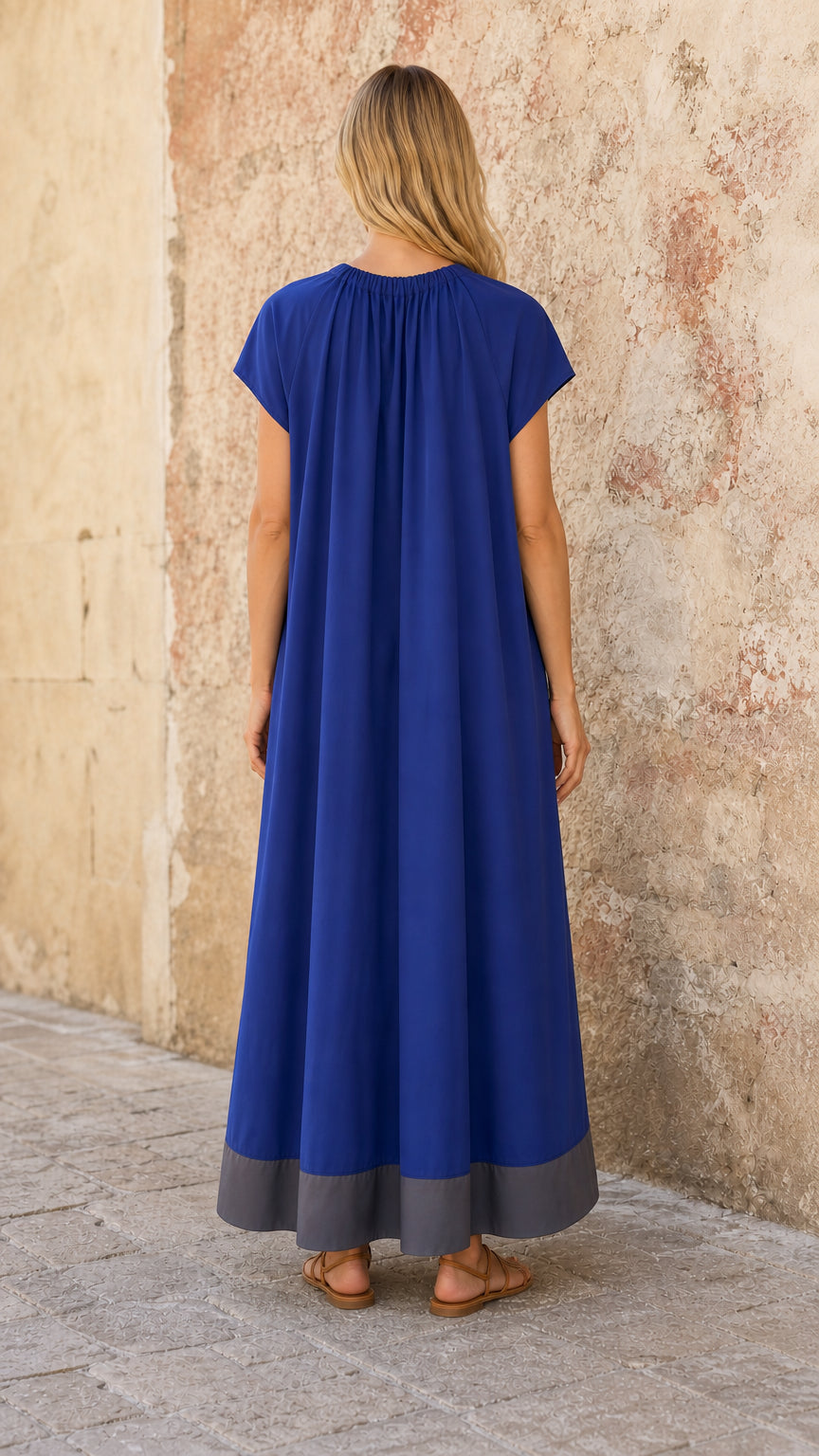 Back view of model in Royal Blue gathered neckline maxi dress