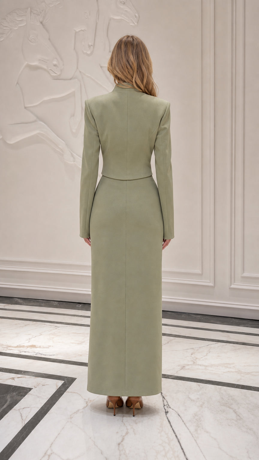 Back view of model wearing sage green matching set