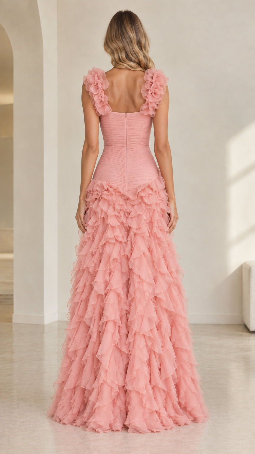 Back view of dusty pink evening gown showing fitted ruched back and zipper