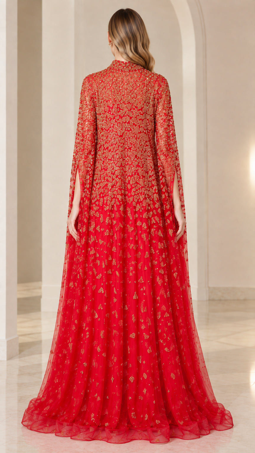 Back view of floor-length red sequin evening gown with cape drape