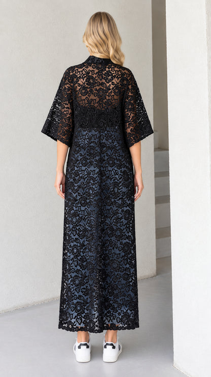 Back view of model wearing long black sheer lace maxi duster cardigan
