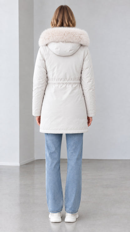 Back view of women's off-white mid-length parka with faux fur trimmed hood