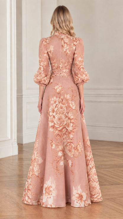 Back view of woman wearing dusty rose vintage floral maxi dress with balloon sleeves