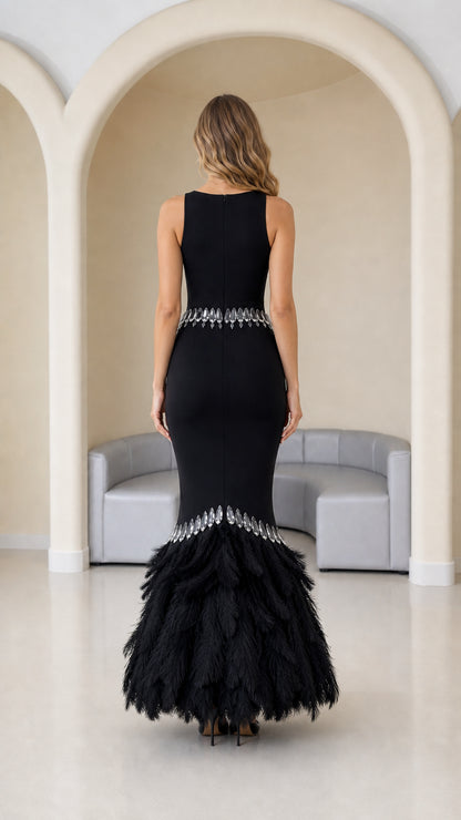 Back view of black full-length formal mermaid dress