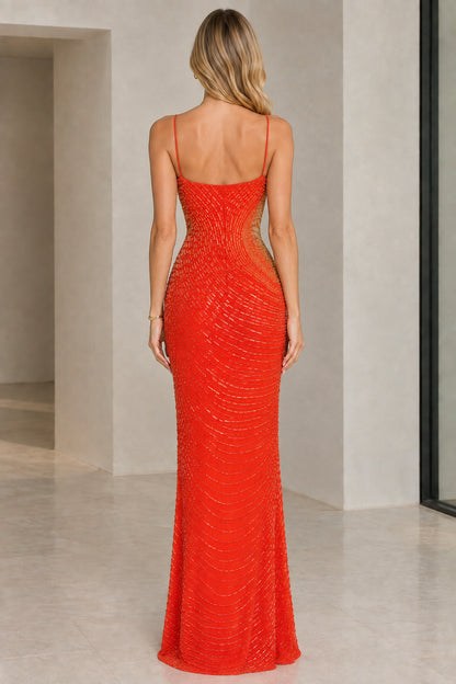 Back view of model in Coral Red floor-length beaded evening dress