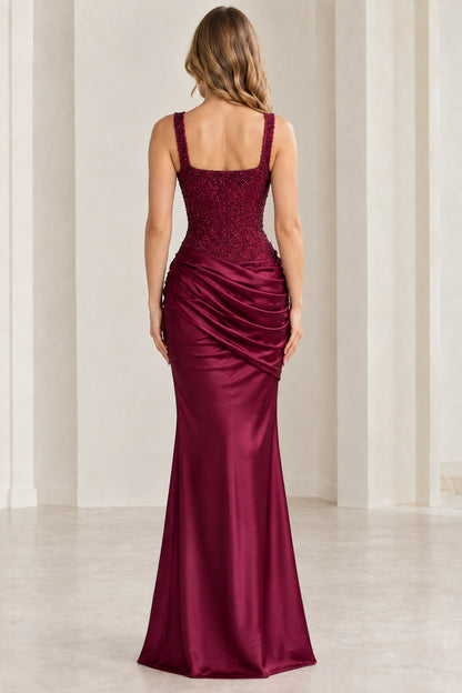 Burgundy formal floor-length dress showing back bodice and drape