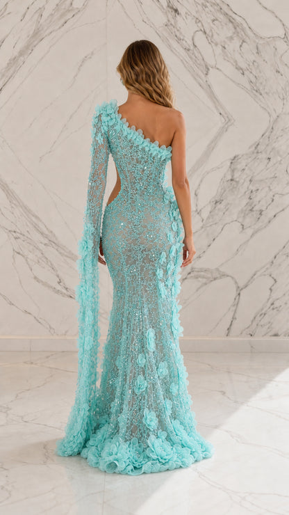 Back view of light blue evening dress with floral cape detail